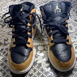 Air Jordan Black and Gold Sneakers